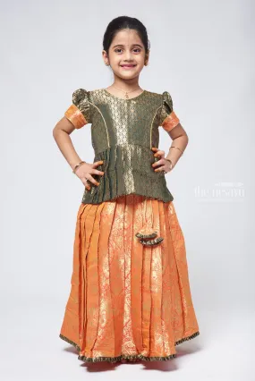 Elegant Brocade Peplum Green Blouse paired with Banarasi Salmon Pink Pattu Pavadai: Timeless South Indian