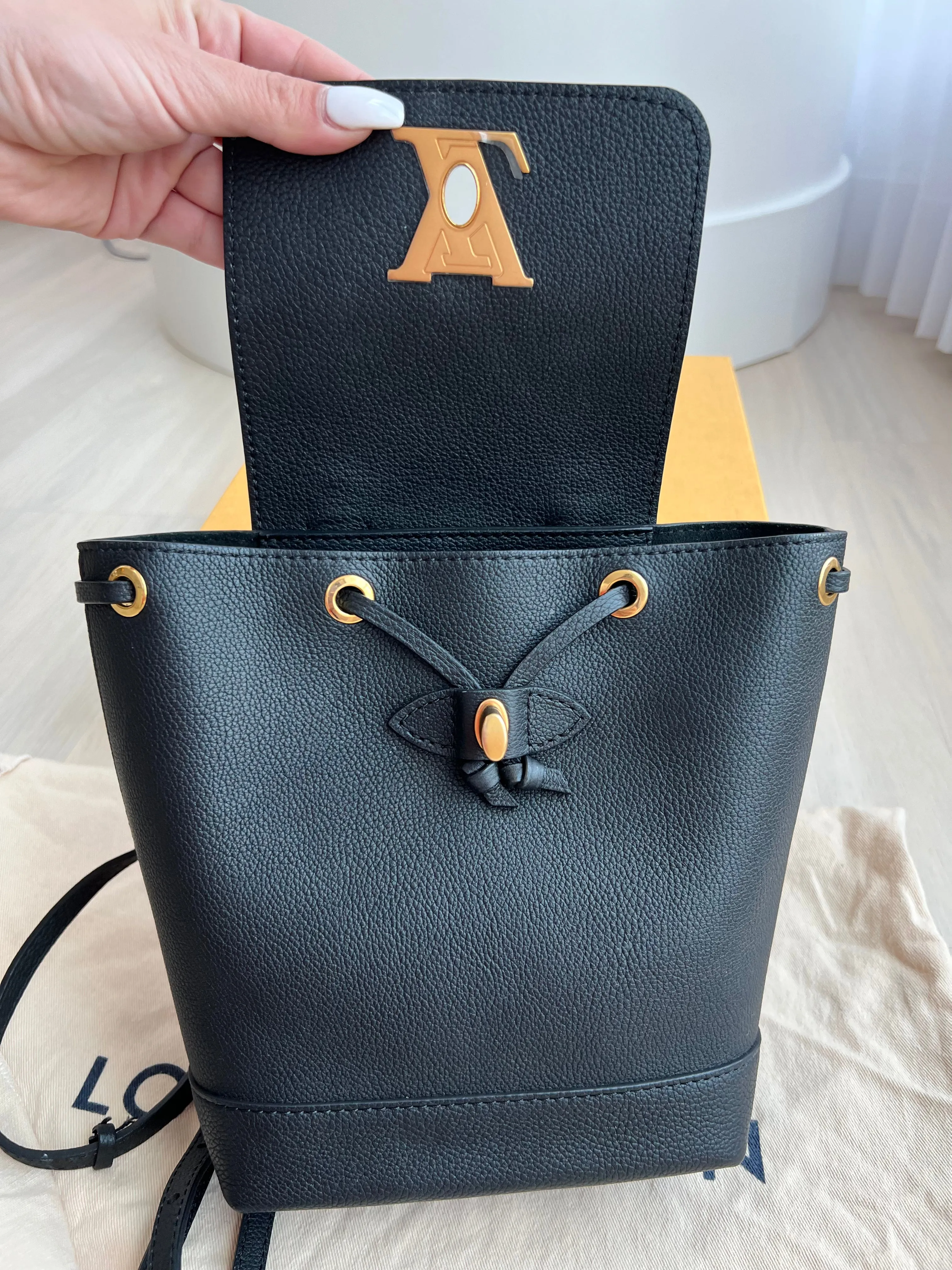 Louis Vuitton Lock Me Backpack